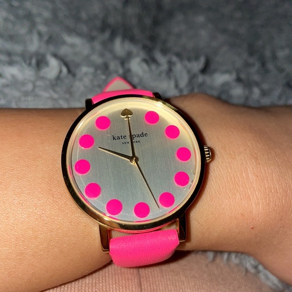 Kate Spade Pink Watch with a gold bezel and metallic face - Picture 1 of 7